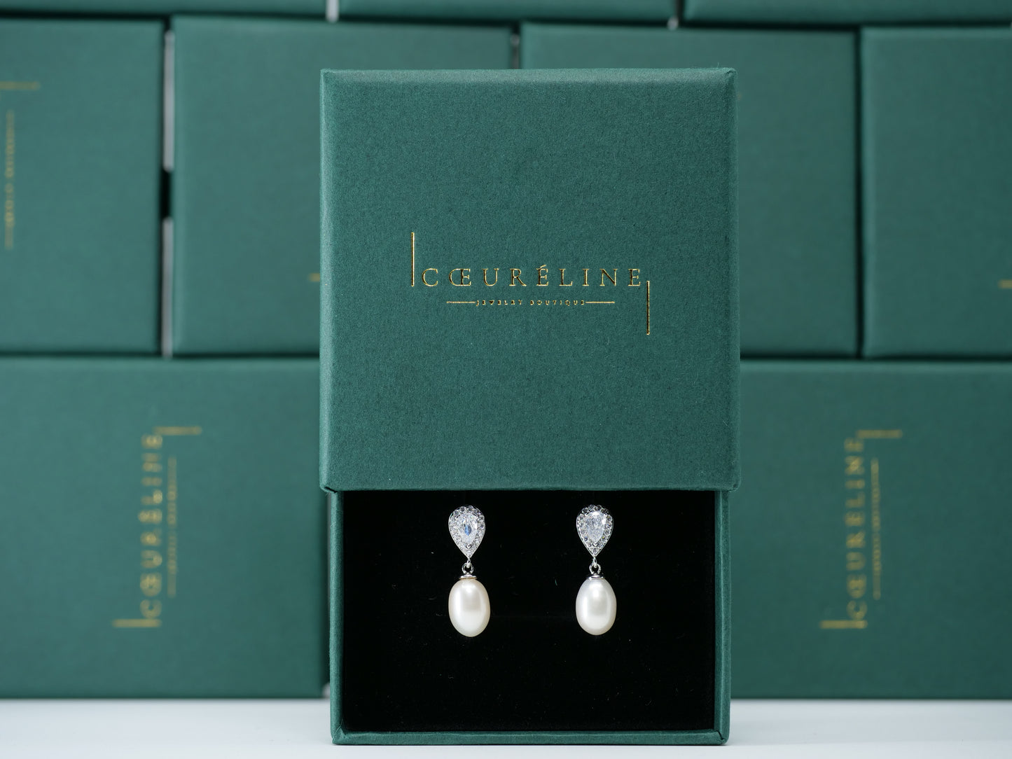 Boucles d'oreilles perles d'eau douce et pierres zircon